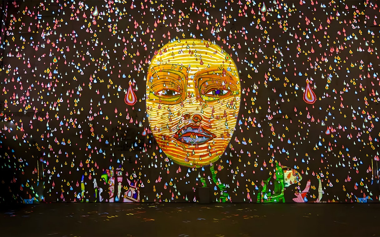 Hundertwasser artwork projection with colorful drops at Port des Lumières, Hamburg.