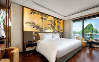 Deluxe double room with bay view on Ha Long Bay 6-star luxury cruise.