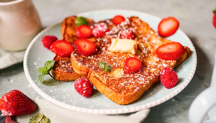 Homemade French toast with Brioche bread topped with berries