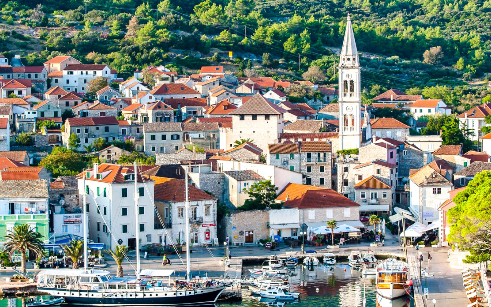 Old town of Jelsa with harbor and church tower, Hvar Island, Croatia.