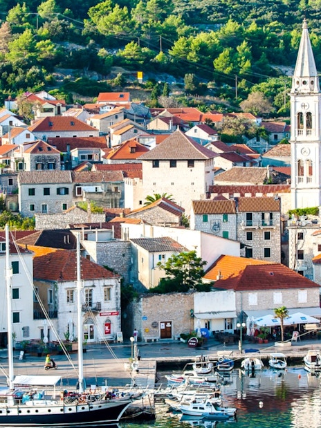 Old town of Jelsa with harbor and church tower, Hvar Island, Croatia.