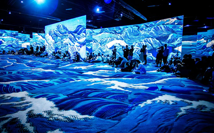 Immersive art installation with Japanese wave projections in Rotterdam.