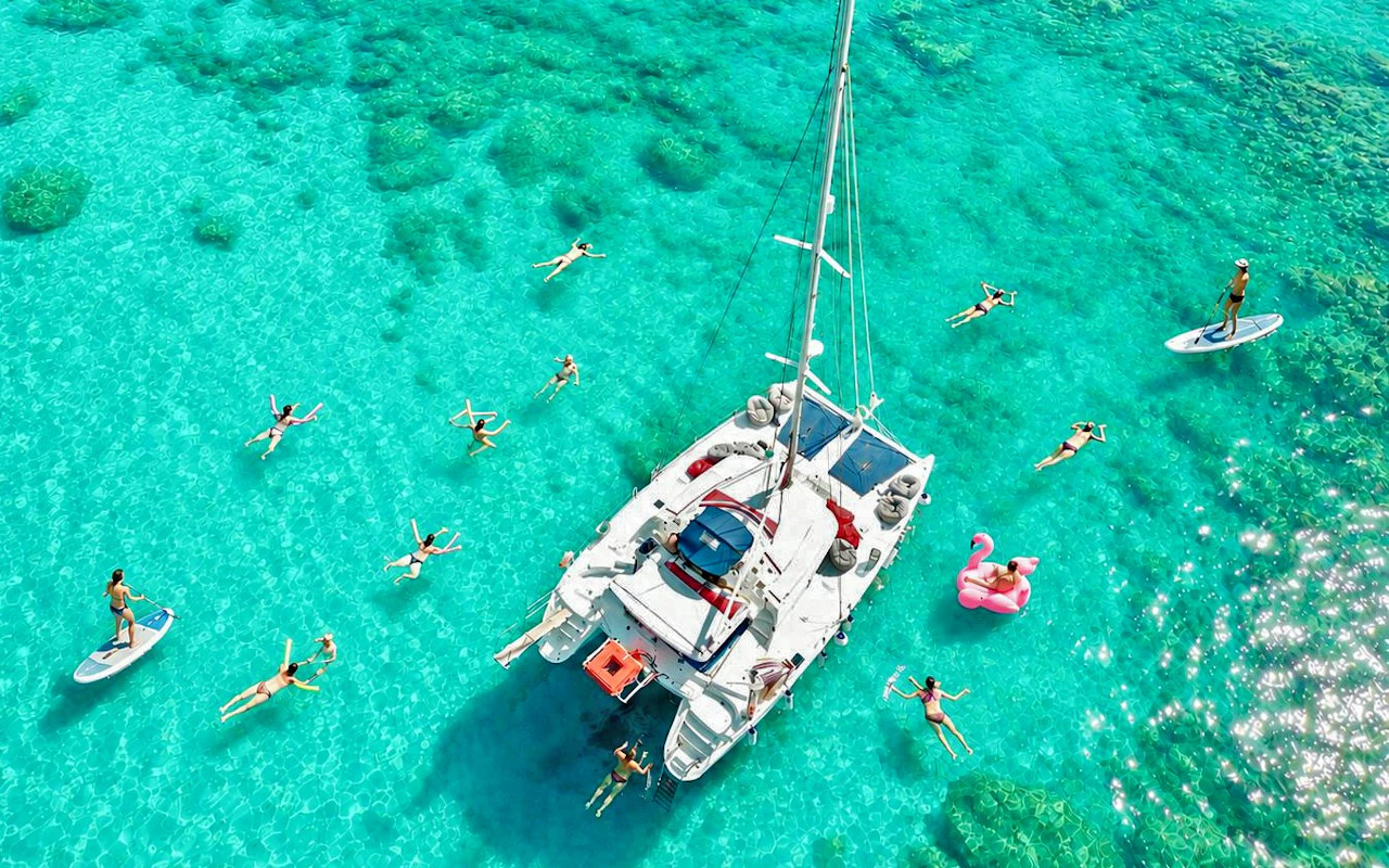 Rhodes: Anthony Quinn Bay, Ladiko Bay, Afandou Bay & Caves Catamaran Cruise with Unlimited Drinks
