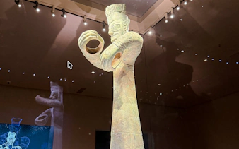 Sanxingdui Museum bronze statue with large eyes and hands, Chengdu Day Tour.