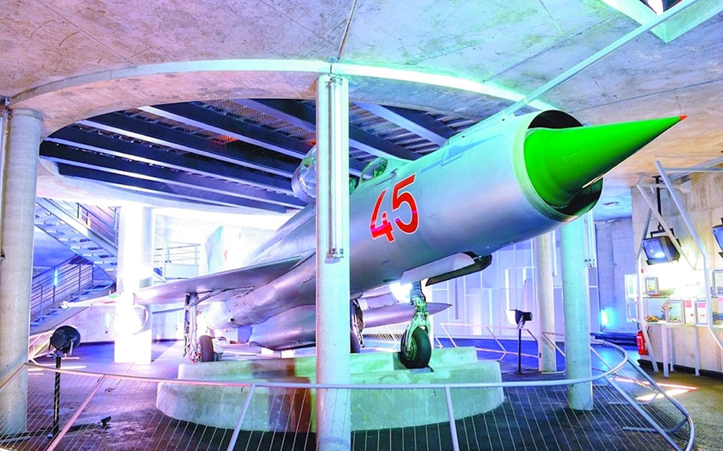 Jet fighter exhibit at Caen Memorial Museum, part of D-Day Landings tour.