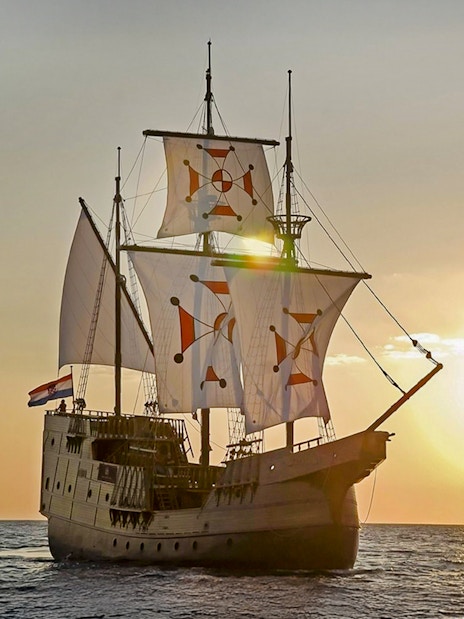 Sunset view of Karaka ship cruise on the sea.