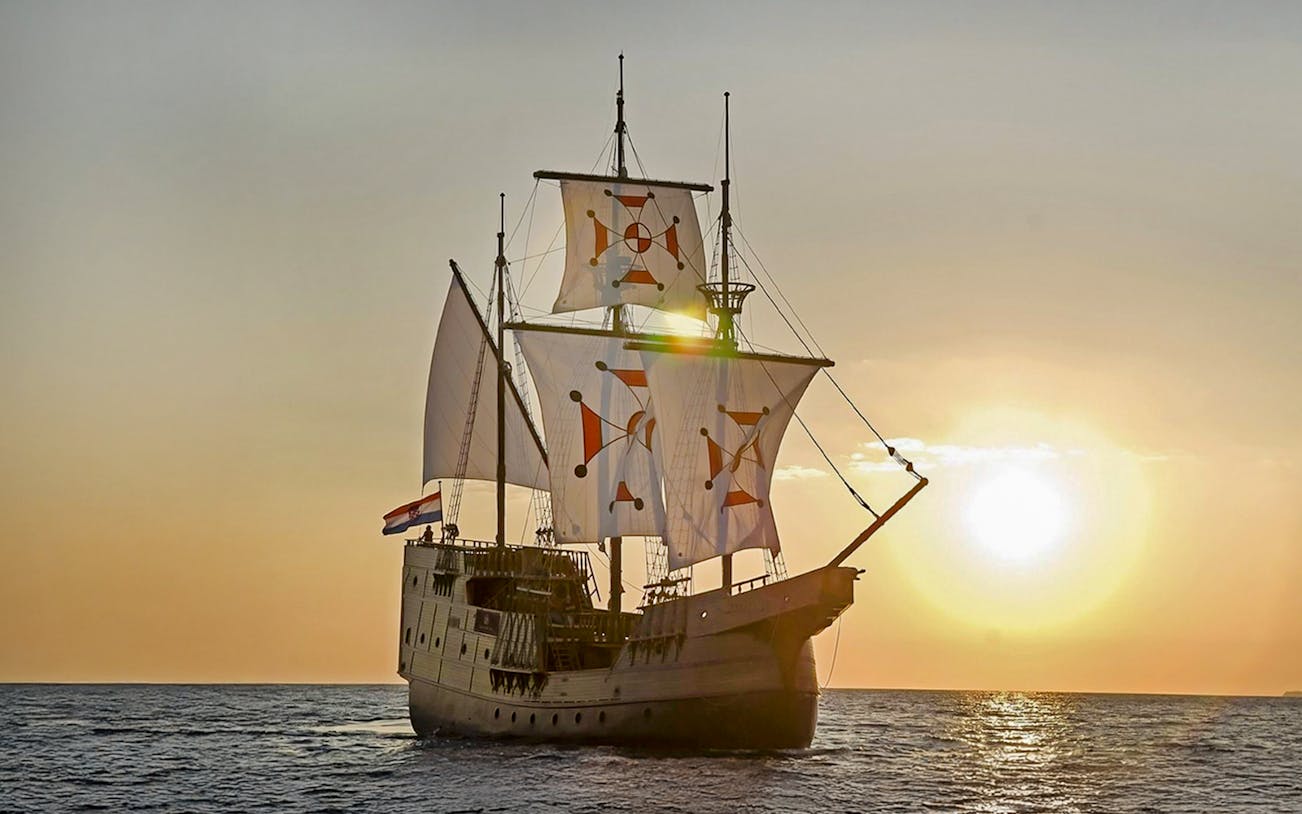 Sunset view of Karaka ship cruise on the sea.