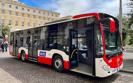 Shuttle bus for airport transfer between Naples Capodichino Airport and Naples Maritime Station.