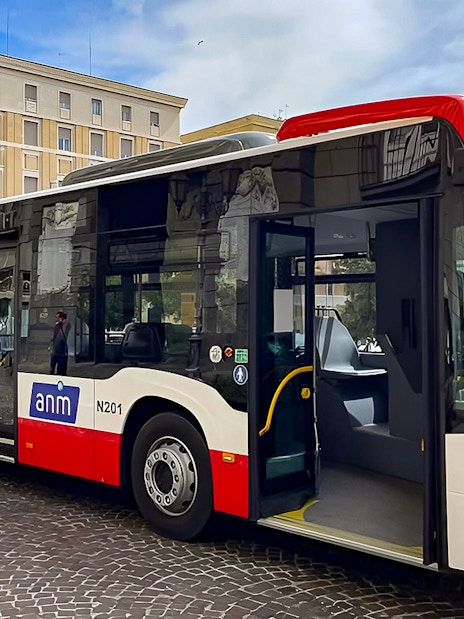 Shuttle bus for airport transfer between Naples Capodichino Airport and Naples Maritime Station.