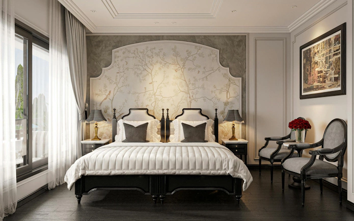 Luxurious bedroom on La Casta Star Cruise, Lan Ha Bay, featuring elegant decor and large windows.