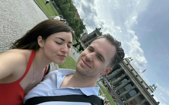 Couple in front of Berlin's Altes Museum during self-guided city exploration game.