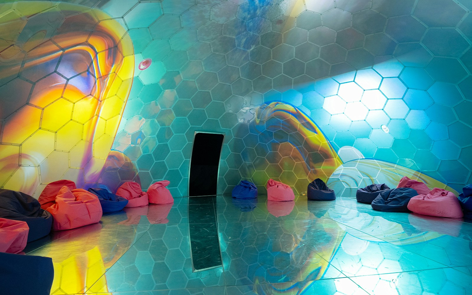 Immersive Bubble Planet exhibit with colorful spheres in Singapore.