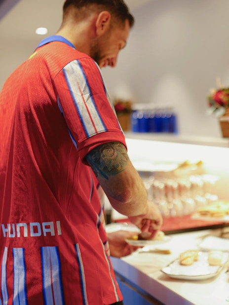 Tourist enjoying lunch buffet at Simeone's Private Box.