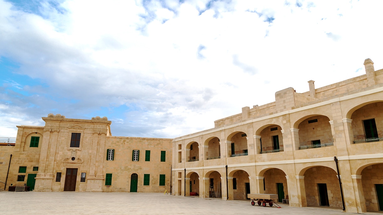 Malta National War Museum exhibits with historical artifacts and military displays.