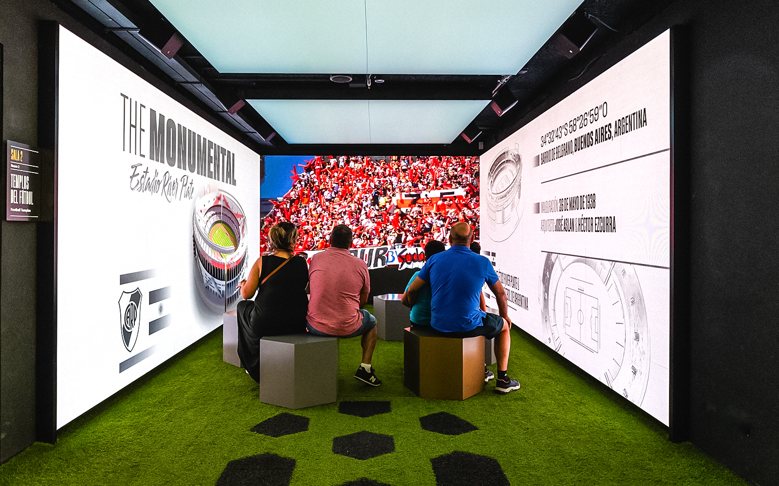 Football memorabilia display at Legends: The Home of Football Museum, featuring iconic jerseys and trophies.