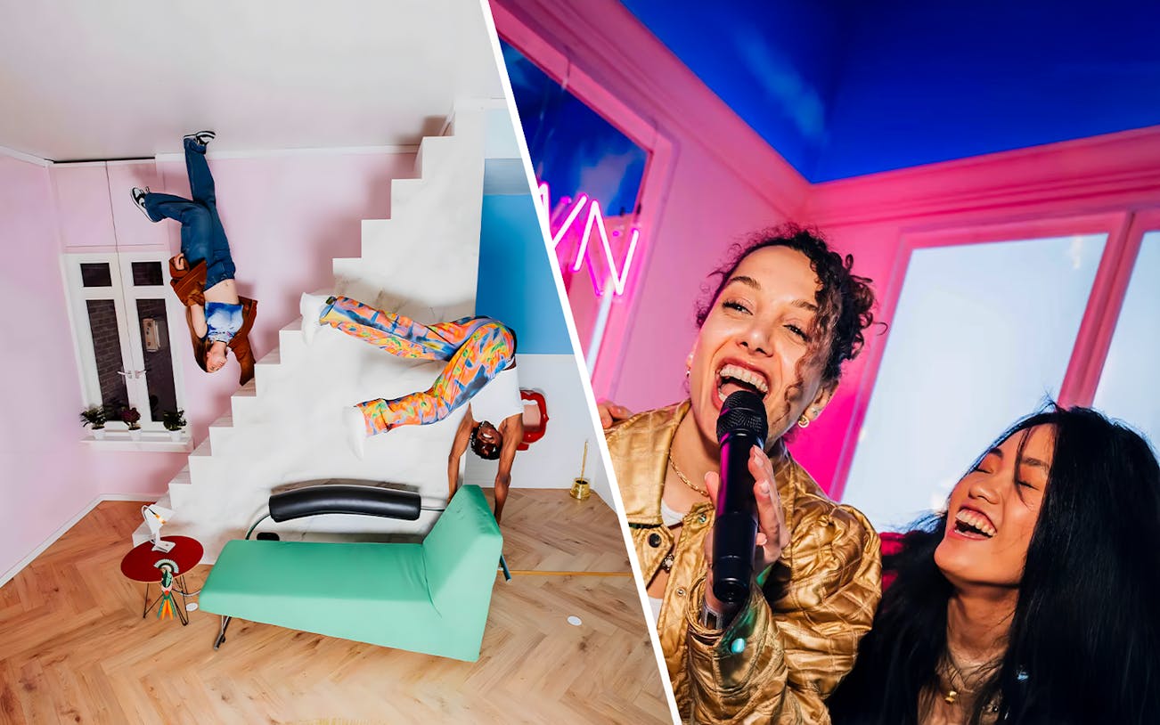 Visitors enjoying interactive exhibits at the Upside Down Museum in Amsterdam.