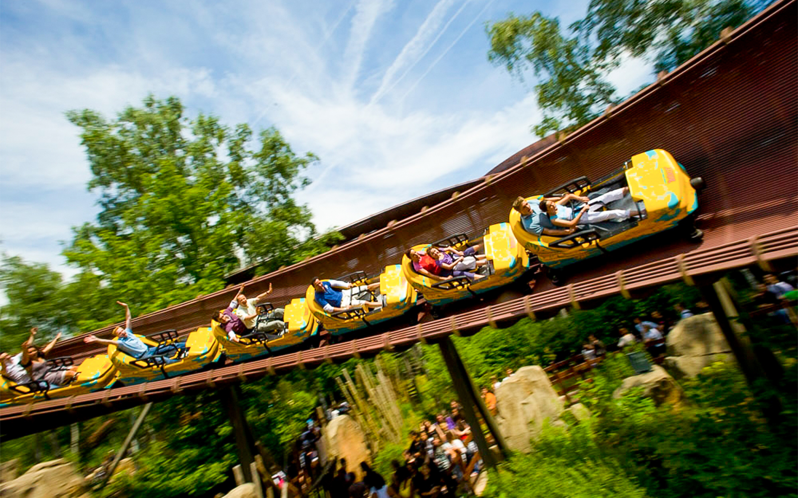Roller coaster ride at Parc Asterix with people enjoying the thrill.