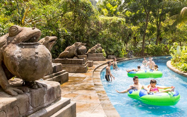 Visitors enjoying a lazy river ride at Sunway Lost World of Tambun, Malaysia.