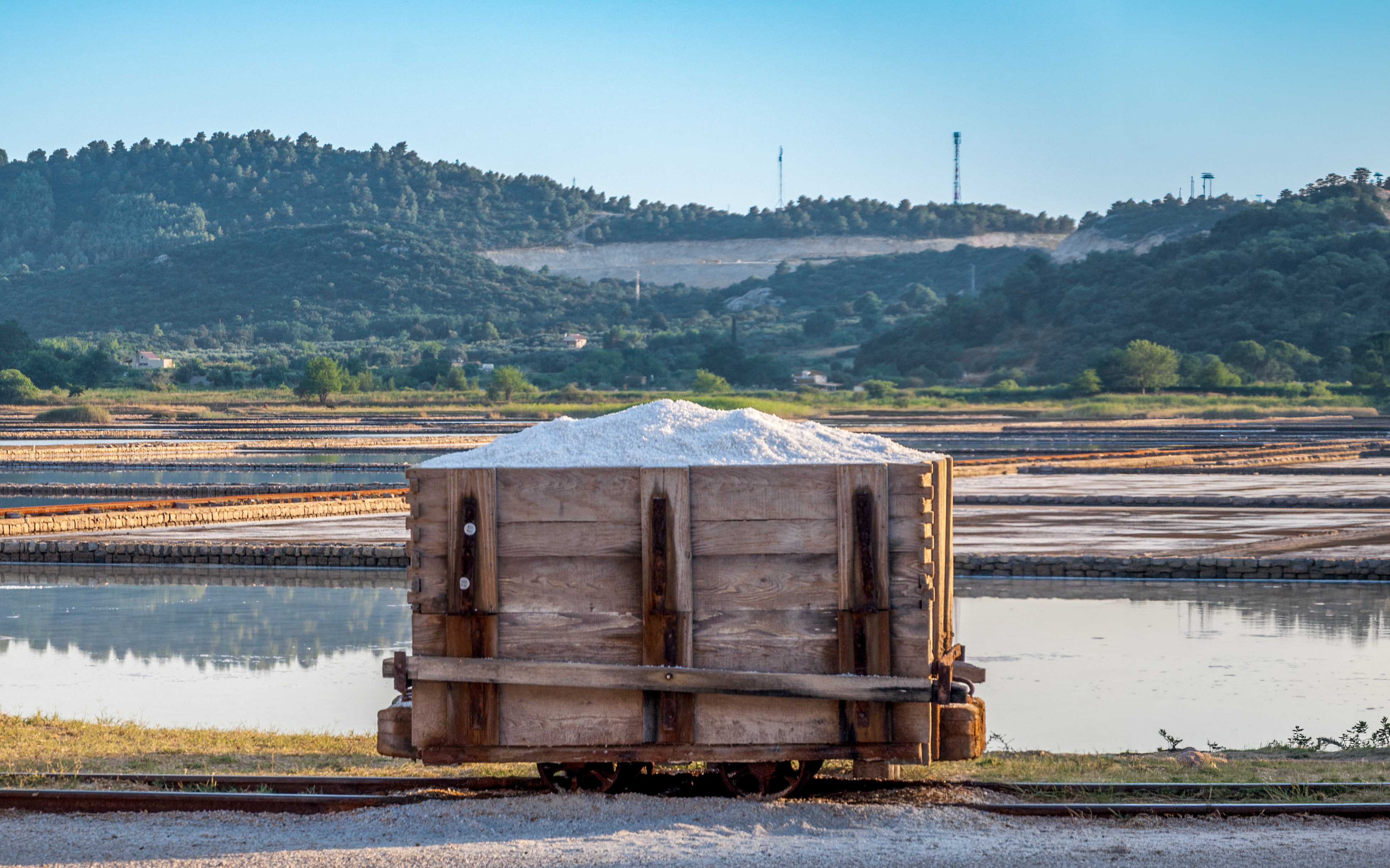 Salt cart at Ston saltworks with salt marshes in Croatia.
