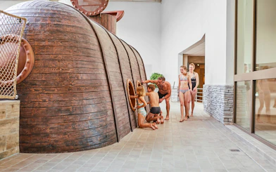Children exploring submarine-themed play area at Bellewaerde Aquapark, Ypres.