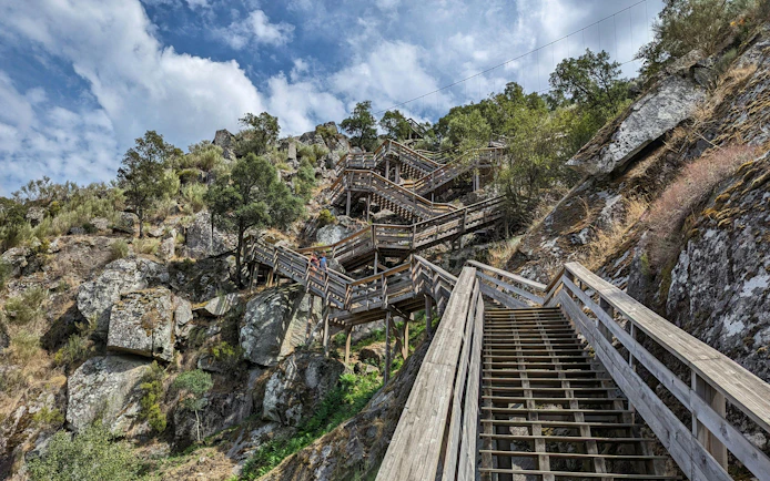 Paiva walkways winding through rocky hills by the Paiva River in Arouca, Portugal.