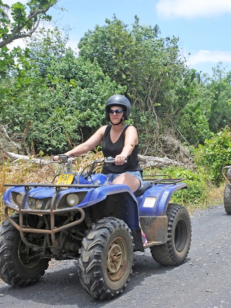 Quad biking group on a forest trail during Antalya safari experience.