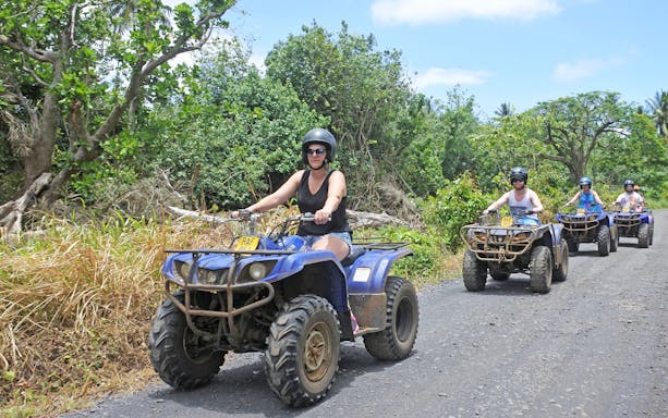 Quad biking group on a forest trail during Antalya safari experience.