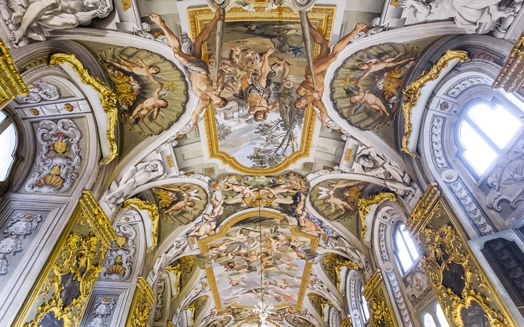 Doria Pamphilj Gallery ceiling with intricate frescoes and gold detailing.