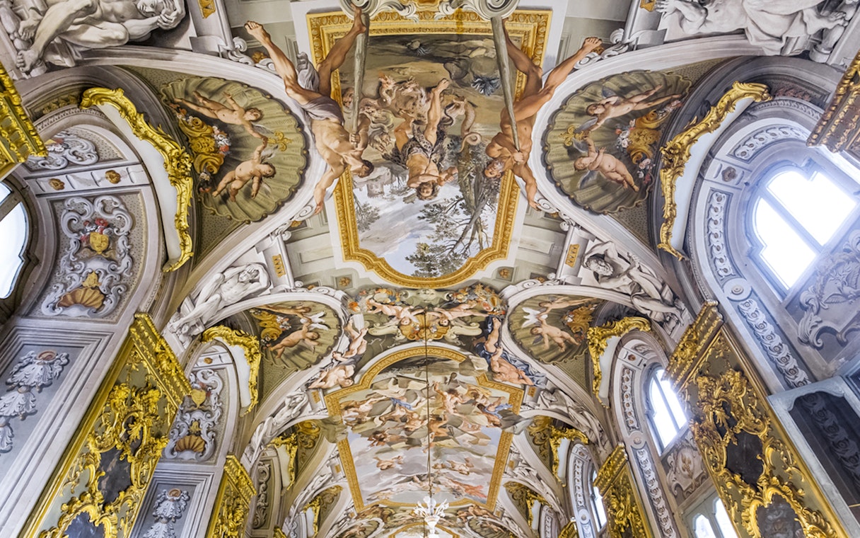 Doria Pamphilj Gallery ceiling with intricate frescoes and gold detailing.