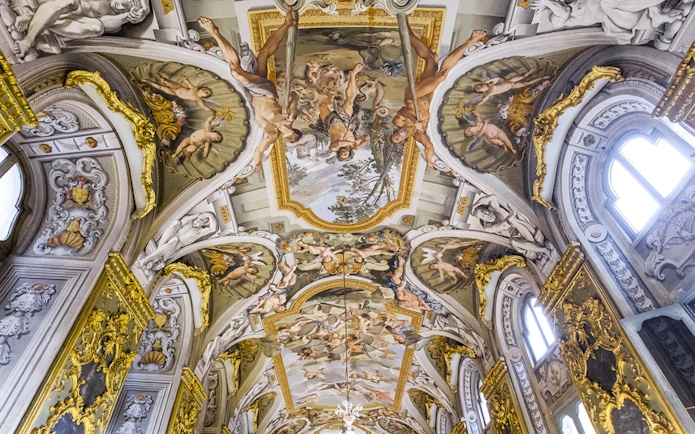 Doria Pamphilj Gallery ceiling with intricate frescoes and gold detailing.