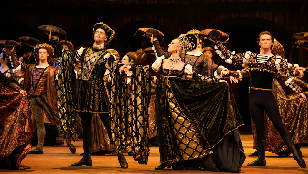 Australian Ballet dancers performing Romeo and Juliet in elaborate costumes.
