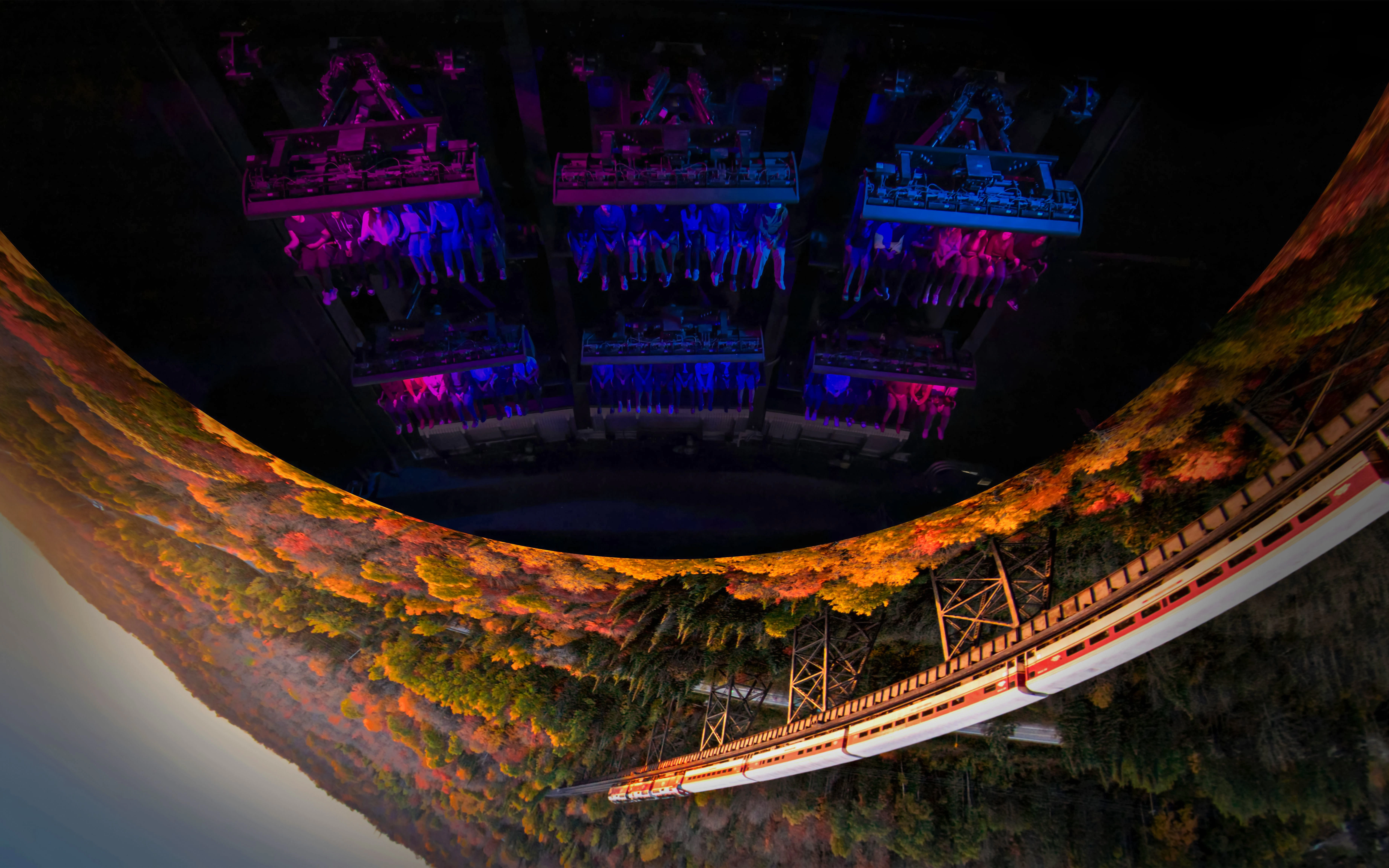 Flyover Chicago experience with suspended seats and scenic autumn landscape.