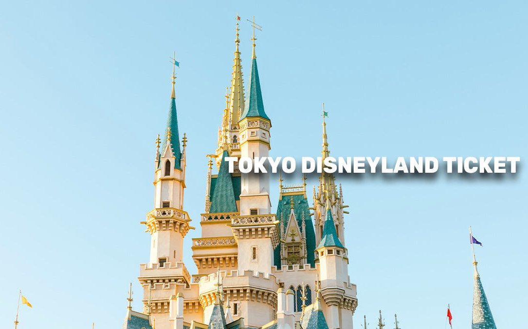 Cinderella Castle at Tokyo Disneyland under clear sky.