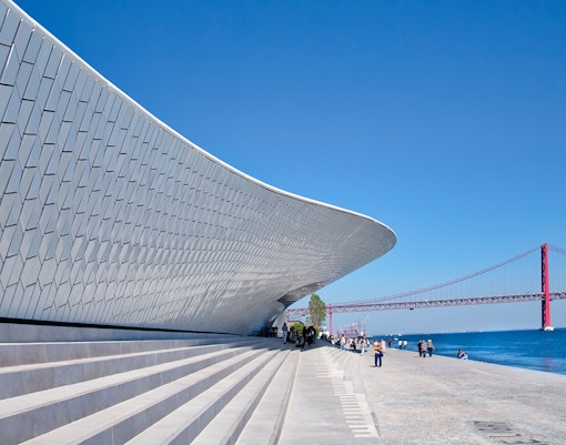 MAAT Museum exterior with river view and bridge in Lisbon.