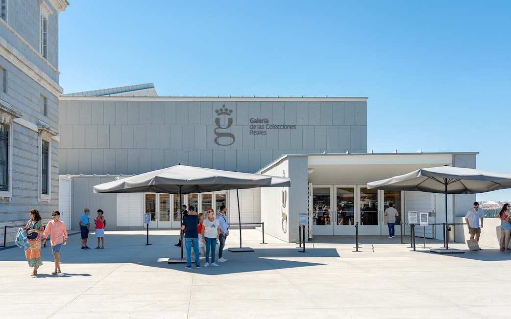 Royal Collection Gallery entrance with visitors outside in Madrid, Spain.