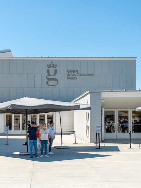 Royal Collection Gallery entrance with visitors outside in Madrid, Spain.