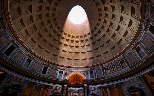 Oculus in the Pantheon dome, Rome, with sunlight streaming through.