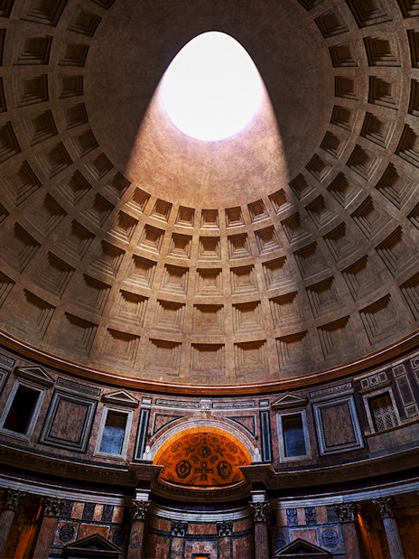 Oculus in the Pantheon dome, Rome, with sunlight streaming through.