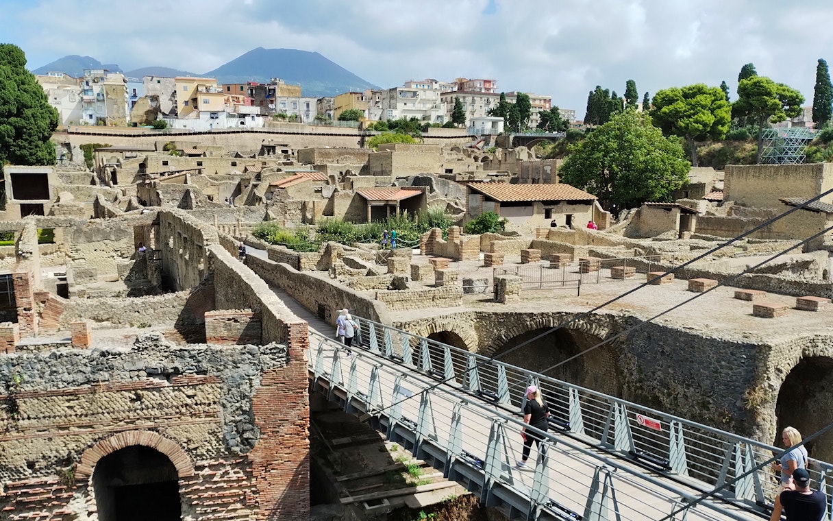 Herculaneum ruins with Mount Vesuvius in the background, Italy.