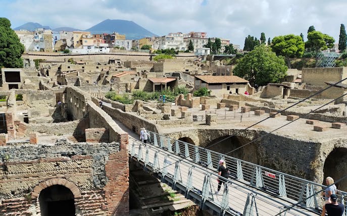 Herculaneum ruins with Mount Vesuvius in the background, Italy.