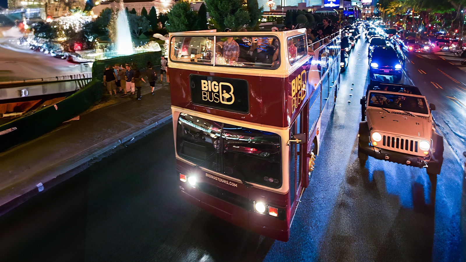 Big Bus night tour bus on road