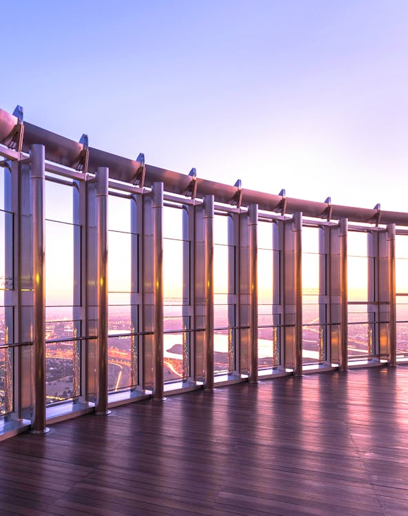 Observation deck view from Burj Khalifa, Dubai at sunset.