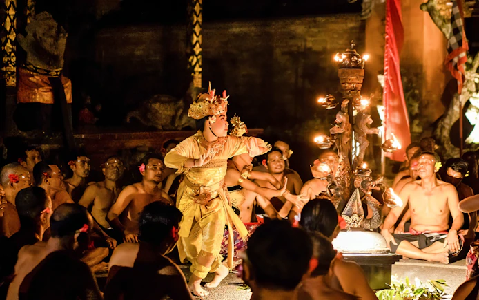Kecak and Fire Dance performance at Ubud Peliatan Palace, Bali, with dancers in traditional attire.