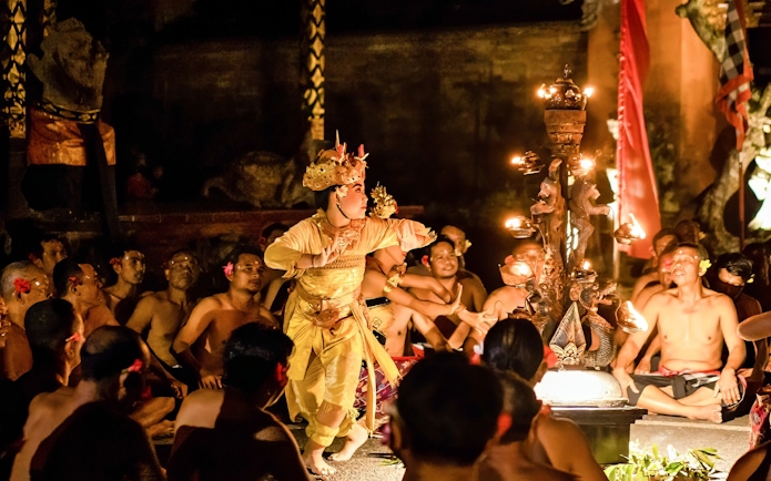 Kecak and Fire Dance performance at Ubud Peliatan Palace, Bali, with dancers in traditional attire.
