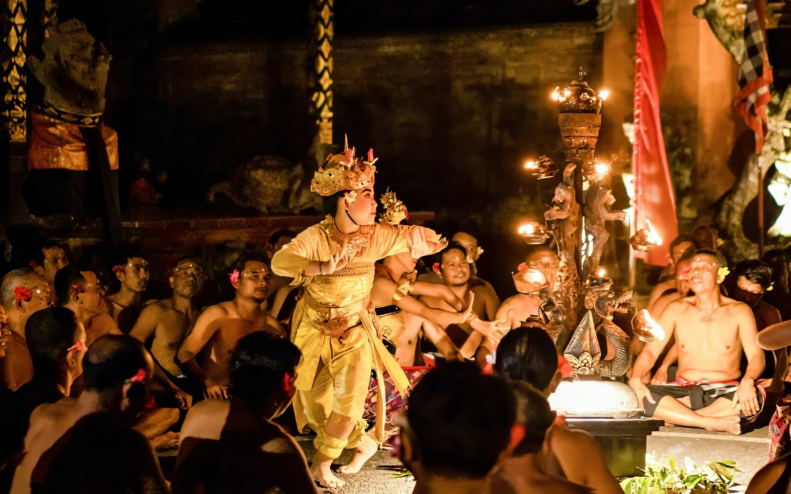 Kecak and Fire Dance performance at Ubud Peliatan Palace, Bali, with dancers in traditional attire.