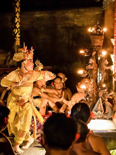 Kecak and Fire Dance performance at Ubud Peliatan Palace, Bali, with dancers in traditional attire.