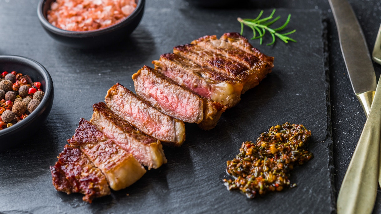Grilled steak with spices and sauce at Gaucho Tower Bridge, London.