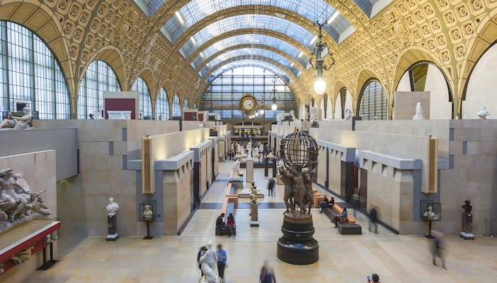 Visitors exploring art at the Orsay Museum in Paris