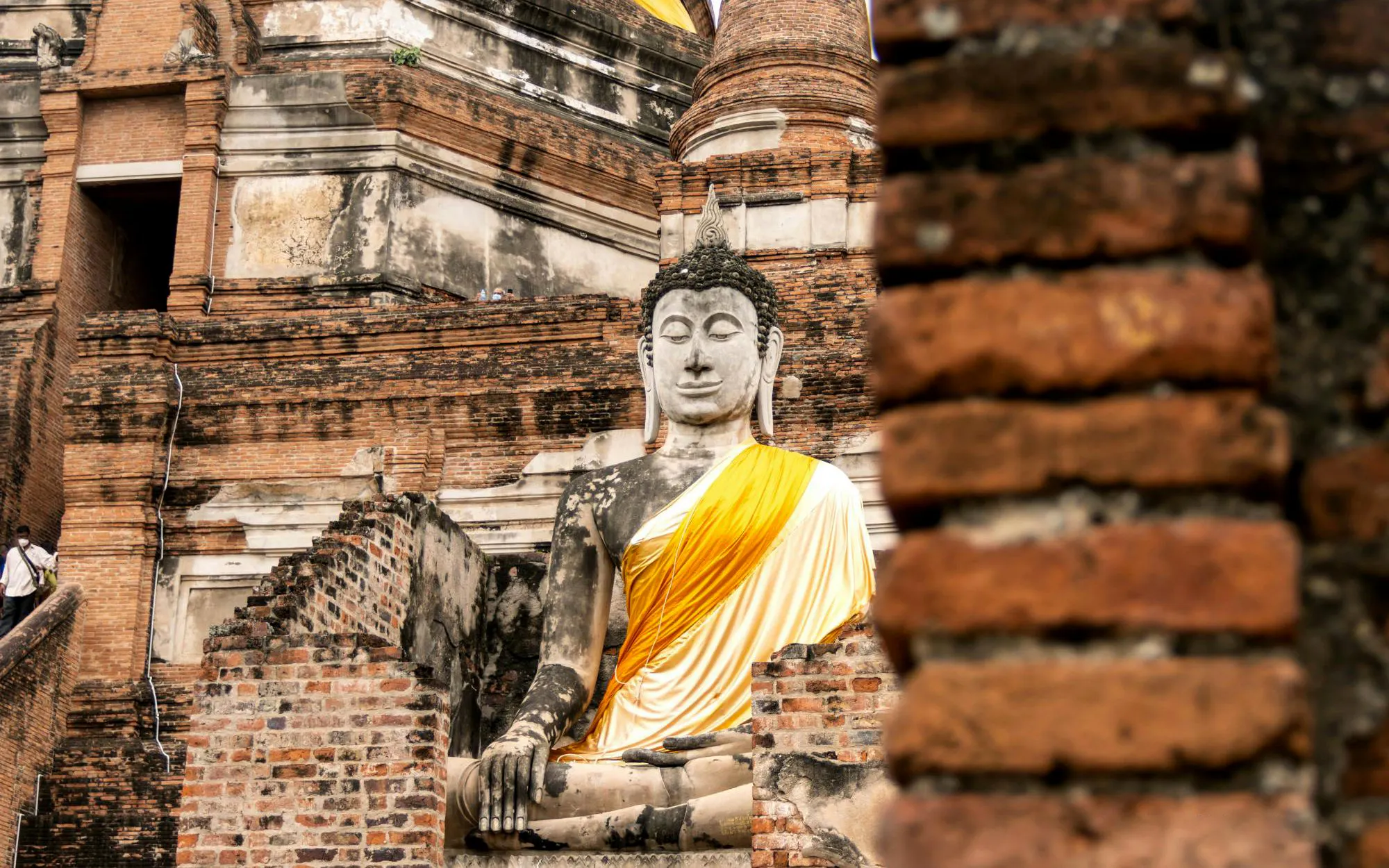 Seated Buddha statue at Wat Yai Chai Mongkol, Ayutthaya, Thailand.