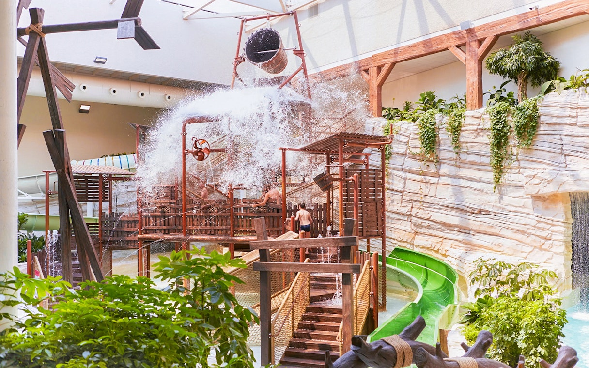 Children enjoying water play area at Aqua Fort, Bellewaerde Aquapark, Belgium.